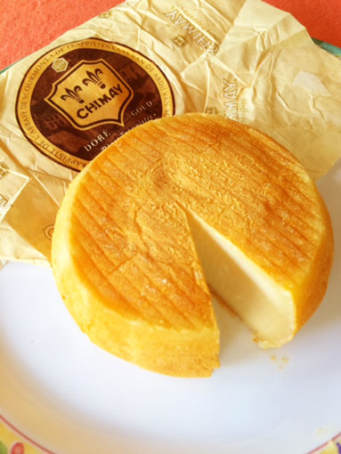 Visite o monastério, almoce e durma no albergue da Chimay queijo