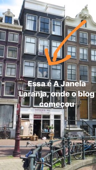 Amsterdam com criança a Janela Laranja